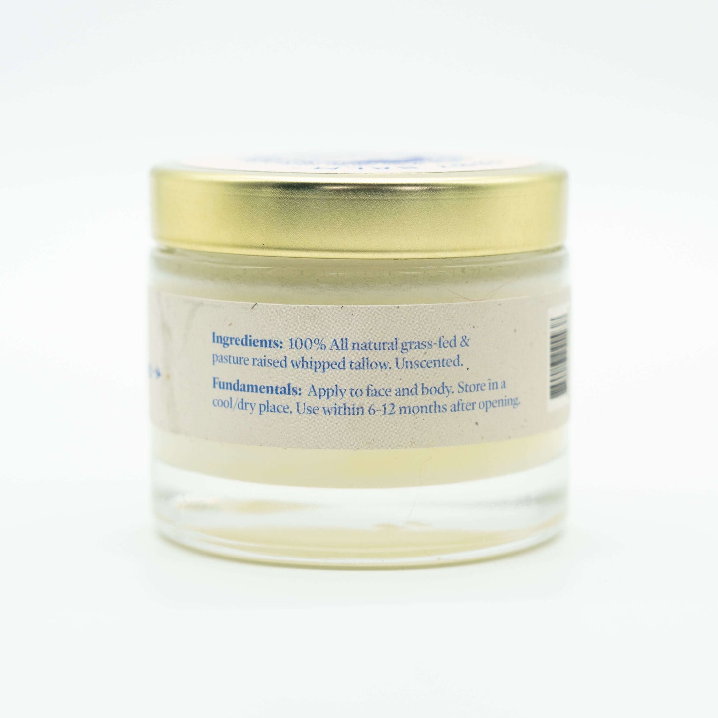 Side view of a jar of Western Provisions organic tallow baby balm showing ingredients