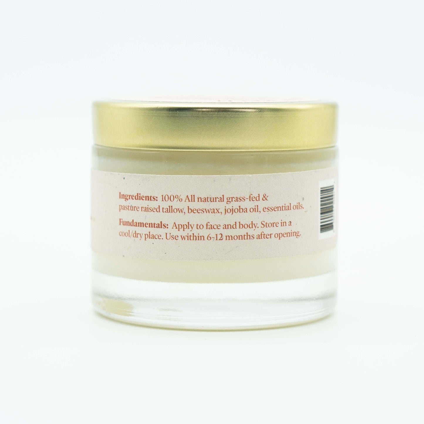 Side view of a jar of Western Provisions organic tallow balm showing ingredients