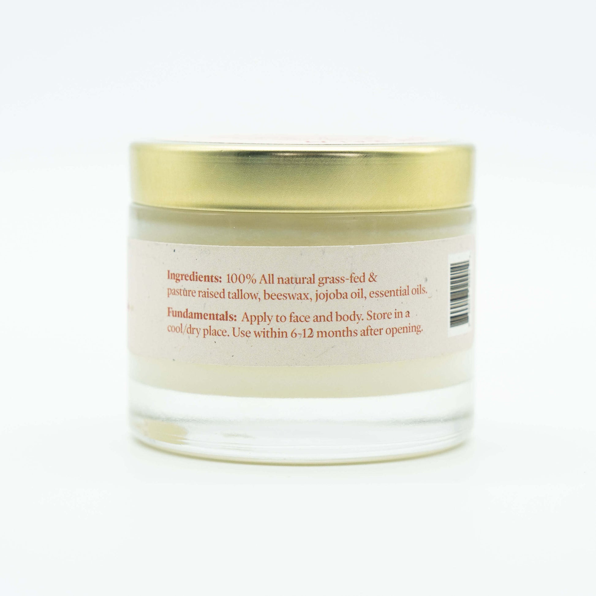 Side view of a jar of Western Provisions organic tallow balm showing ingredients